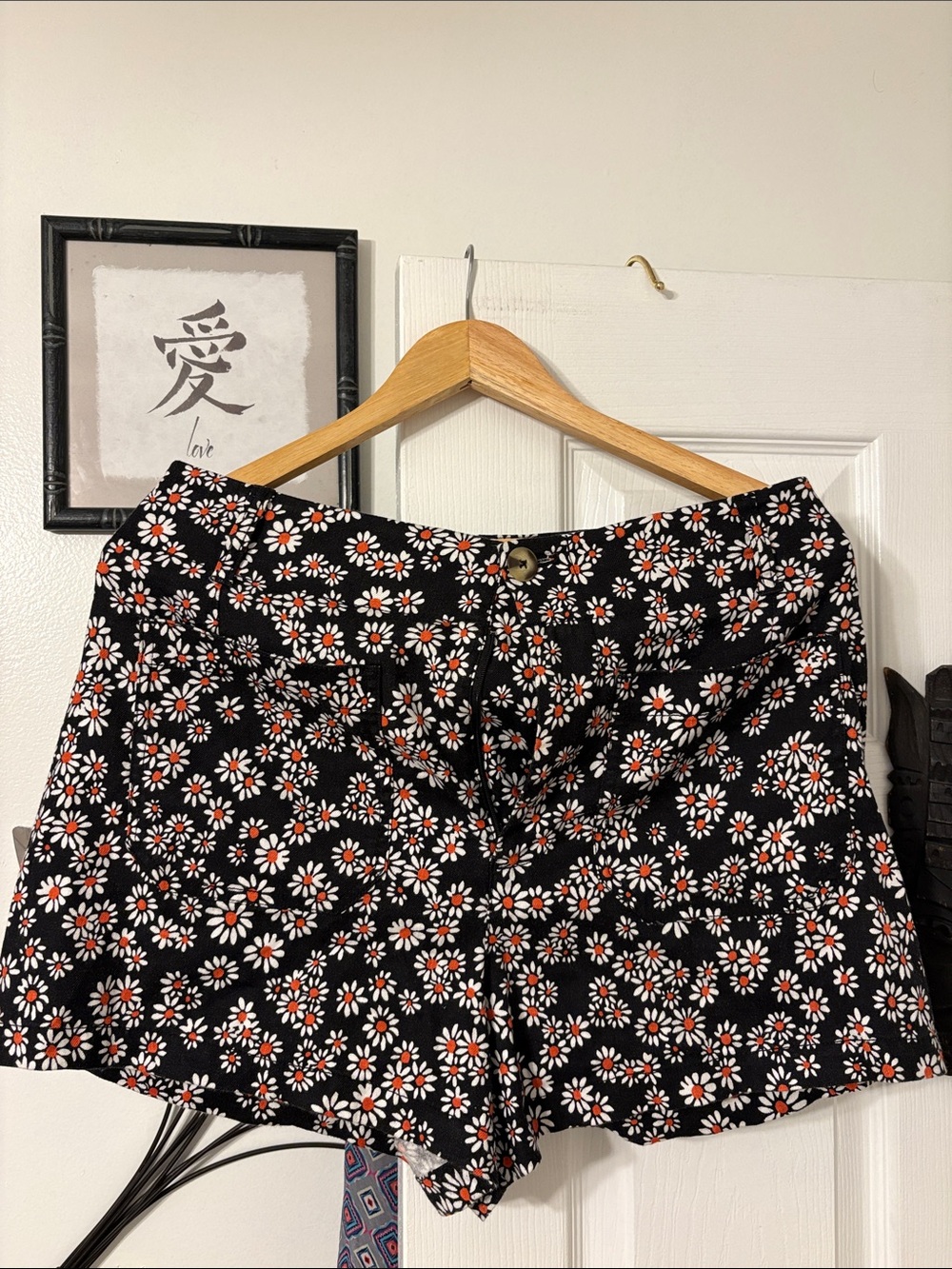 Anthropologie Black Daisy-Print High-Rise Shorts with Orange Centers